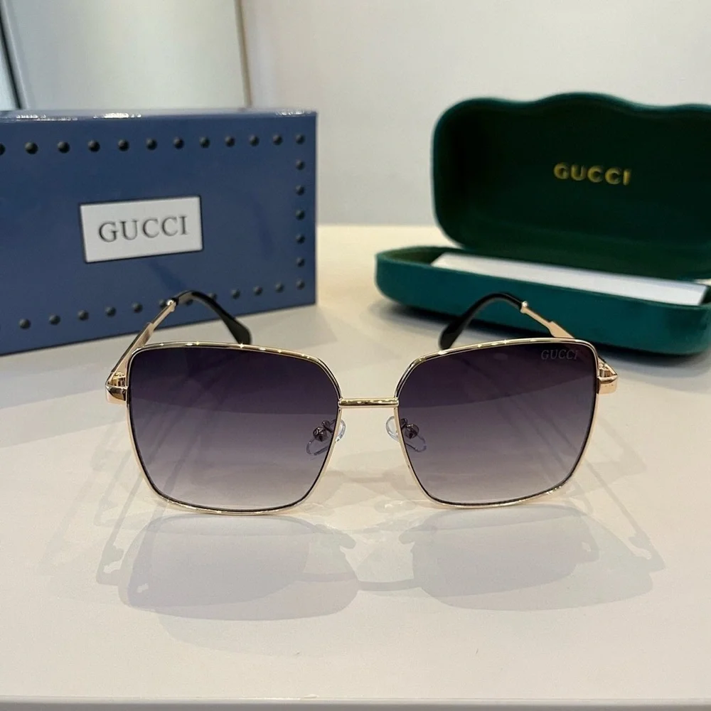 Gucci Gold and Black Women's Sunglasses - Picture 1 of 10